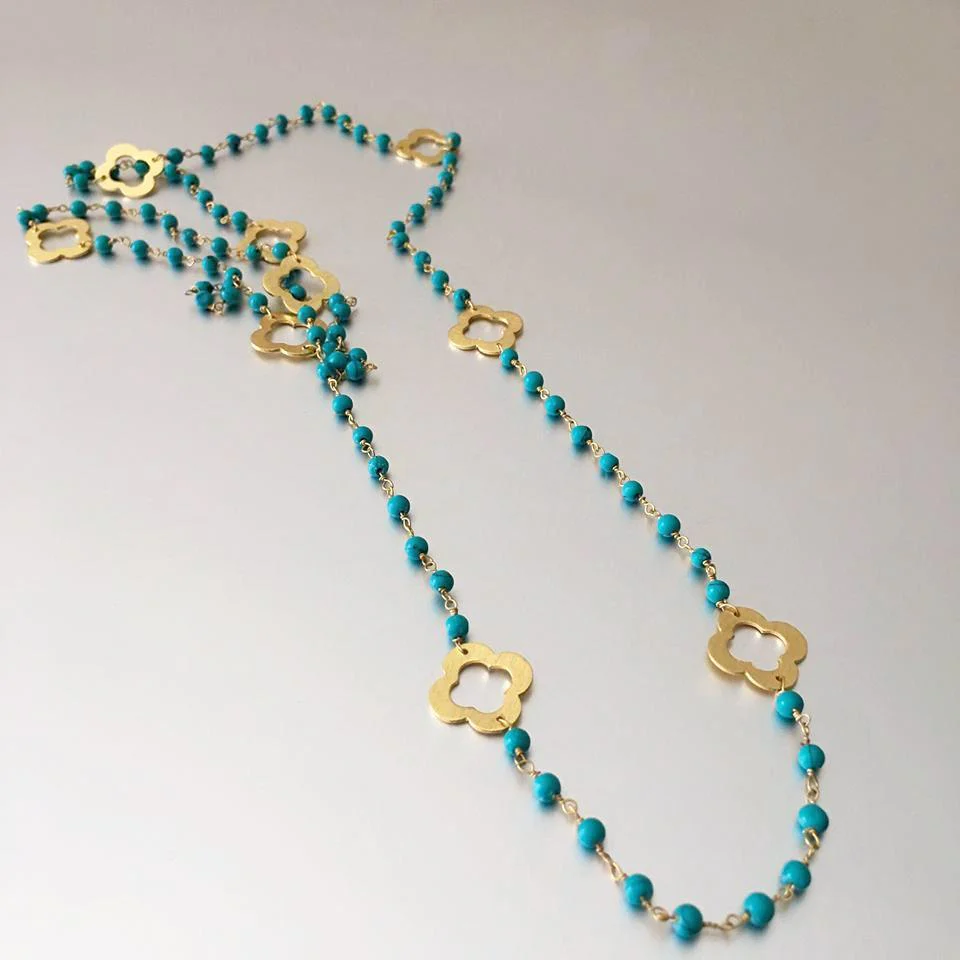 Elegant Turquoise Beaded Necklace With Floral Accents