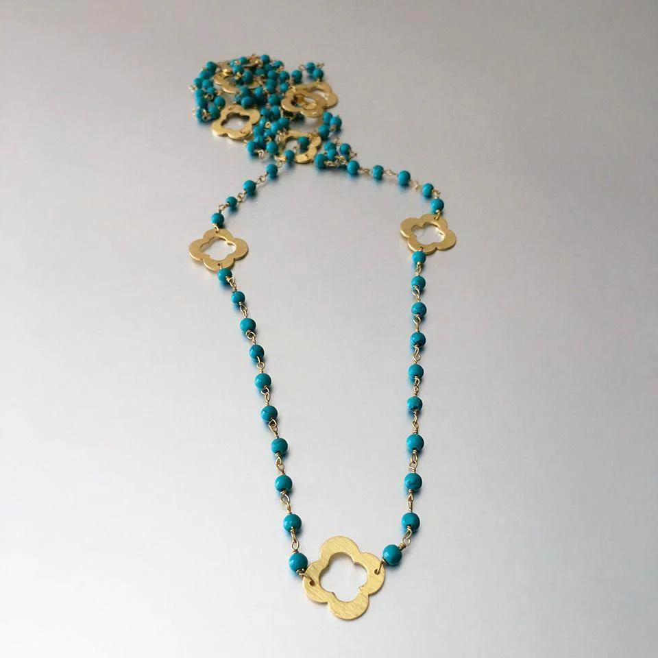 Elegant Turquoise Beaded Necklace With Floral Accents